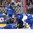 COLOGNE, GERMANY - MAY 12: Italy physiotherapist Guido Tonelli and team doctor Maria Spiridonova tend to injured Daniel Frank #71 while Thomas Larkin #27 and Luca Zanatta #55 look on during preliminary round action against Sweden at the 2017 IIHF Ice Hockey World Championship. (Photo by Andre Ringuette/HHOF-IIHF Images)

